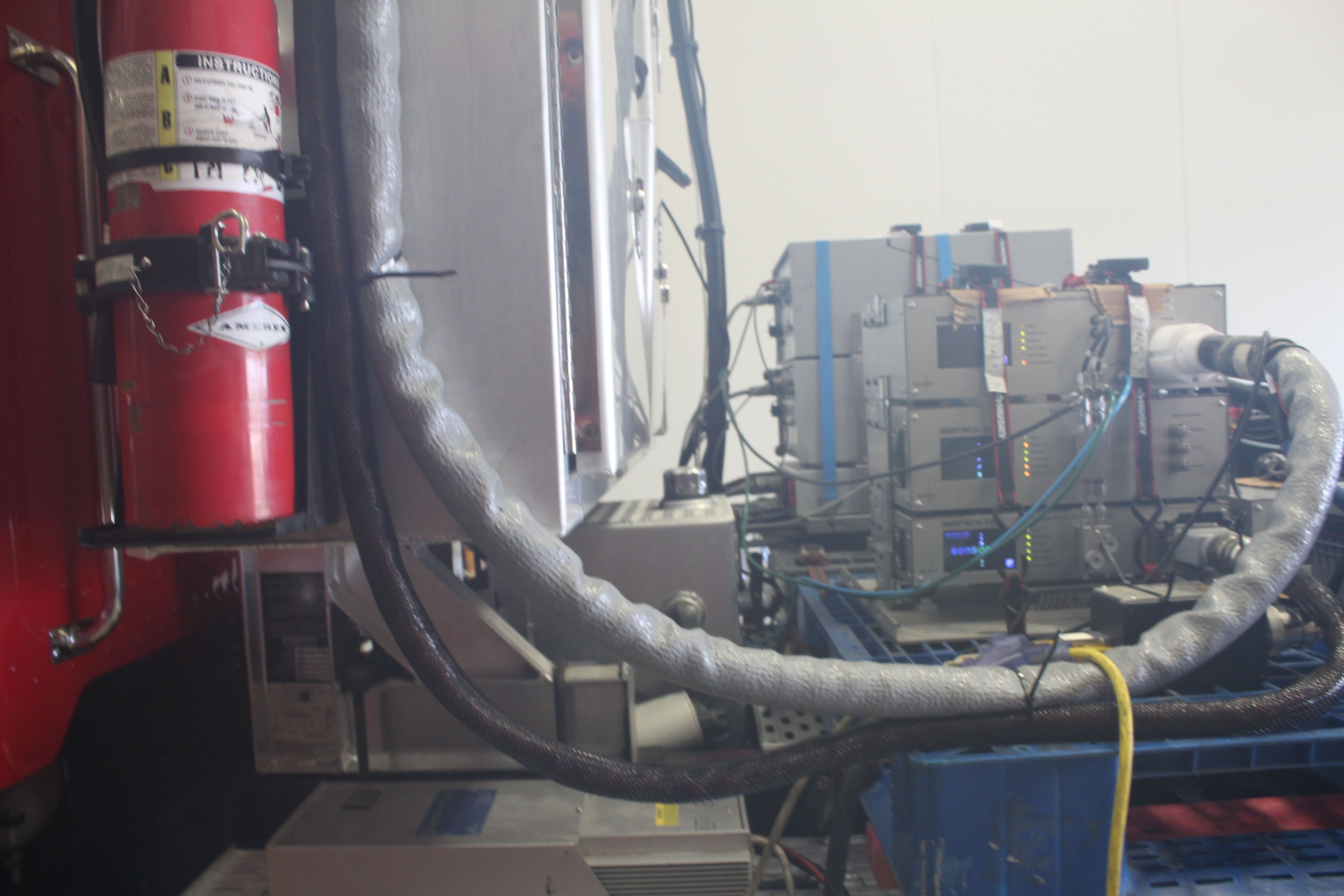 Portable emission monitoring set up for test vehicles.