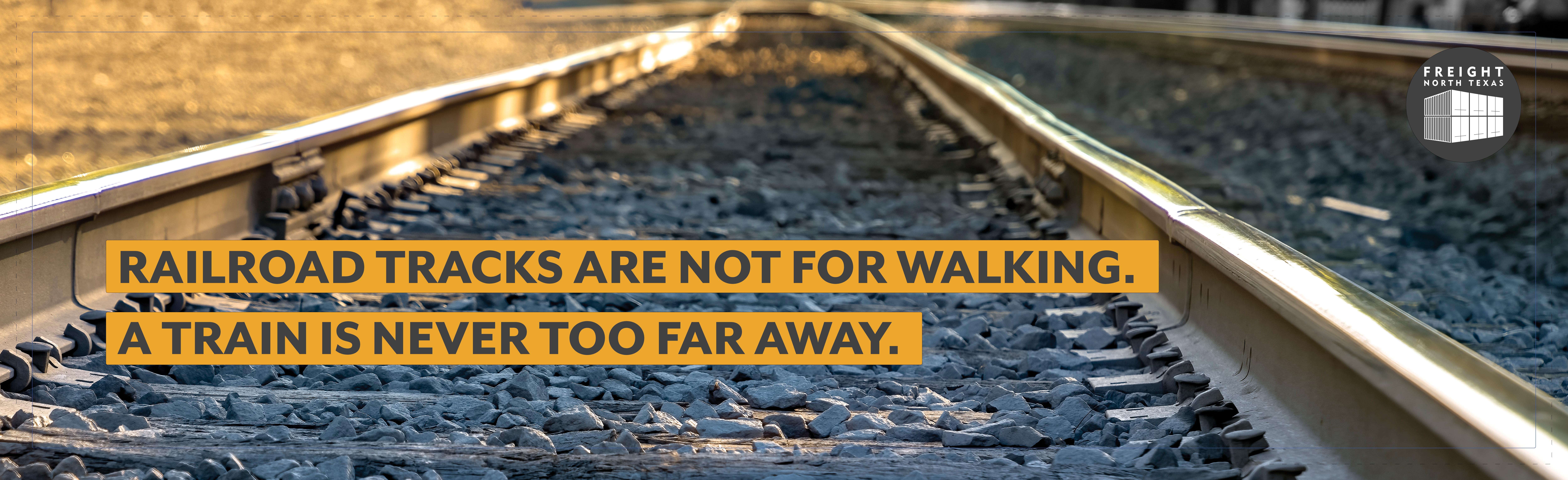 Walk Close up of railroad track with the phrase Railroad tracks are not for walking- a train is never too far away.