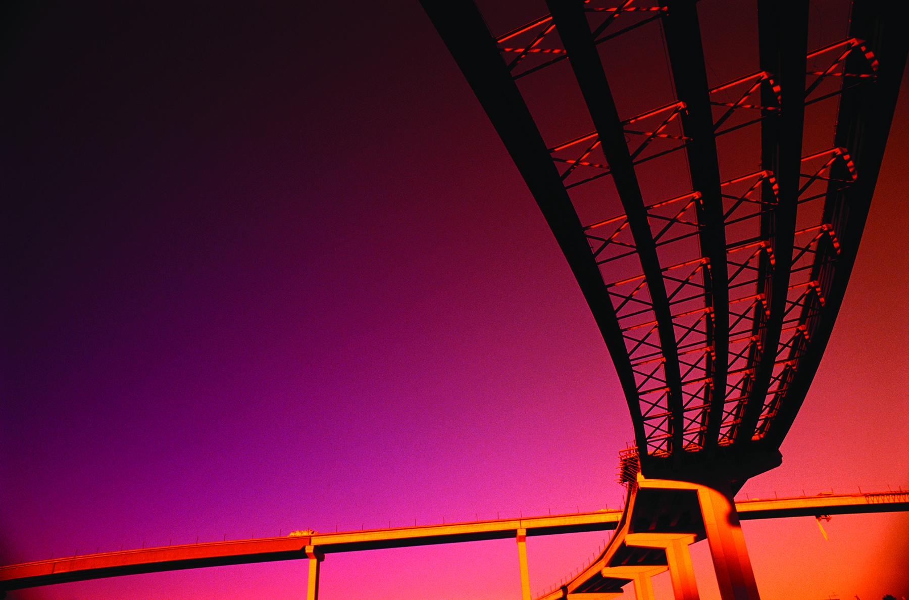 This is an image of a bridge at sunset
