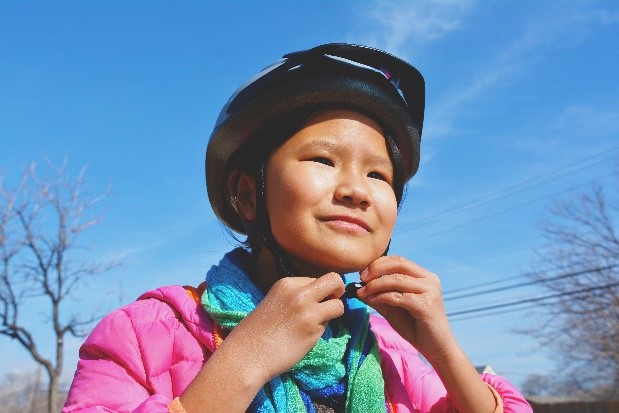 student_with_bike_helmet