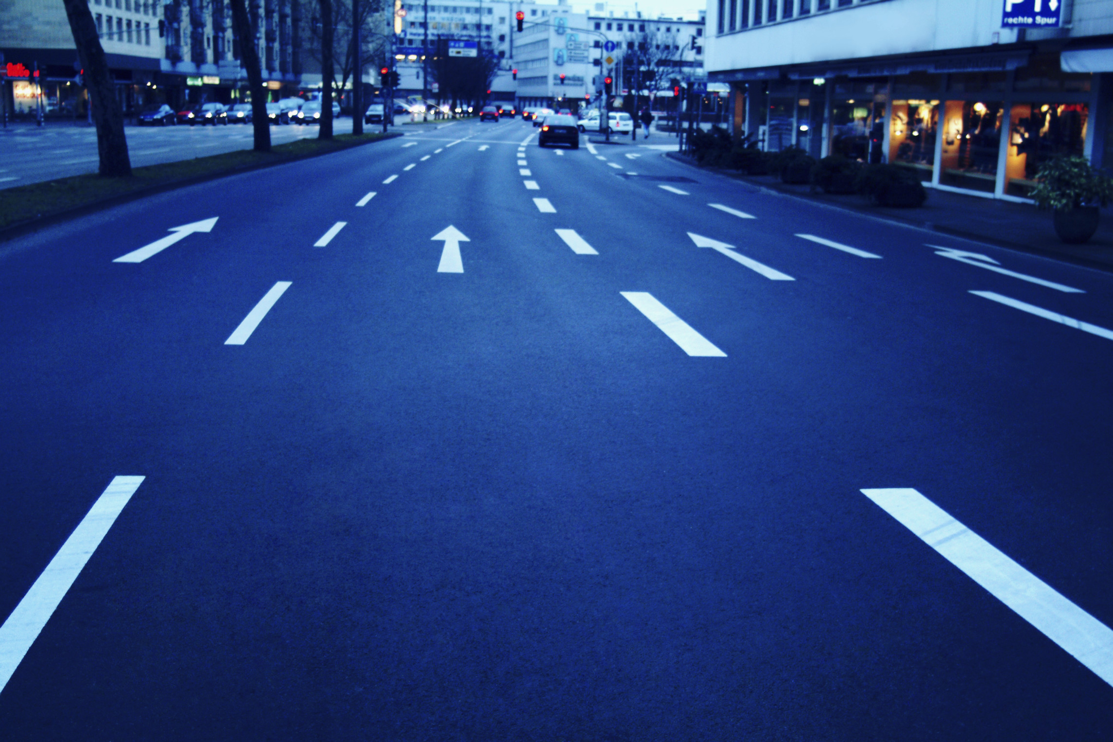 An empty roadway in a large city