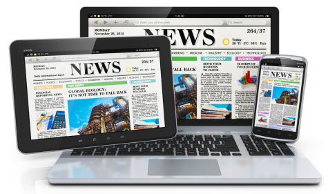 laptop tablet and phone with the word news as a headline