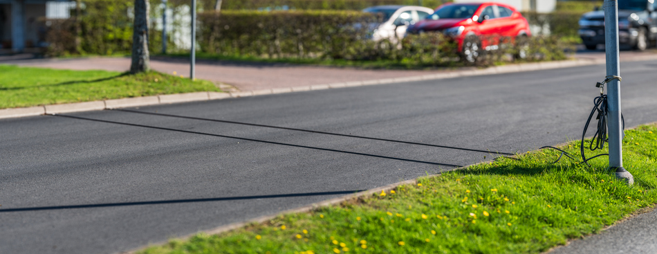 Traffic counting pneumatic lines across an empty road