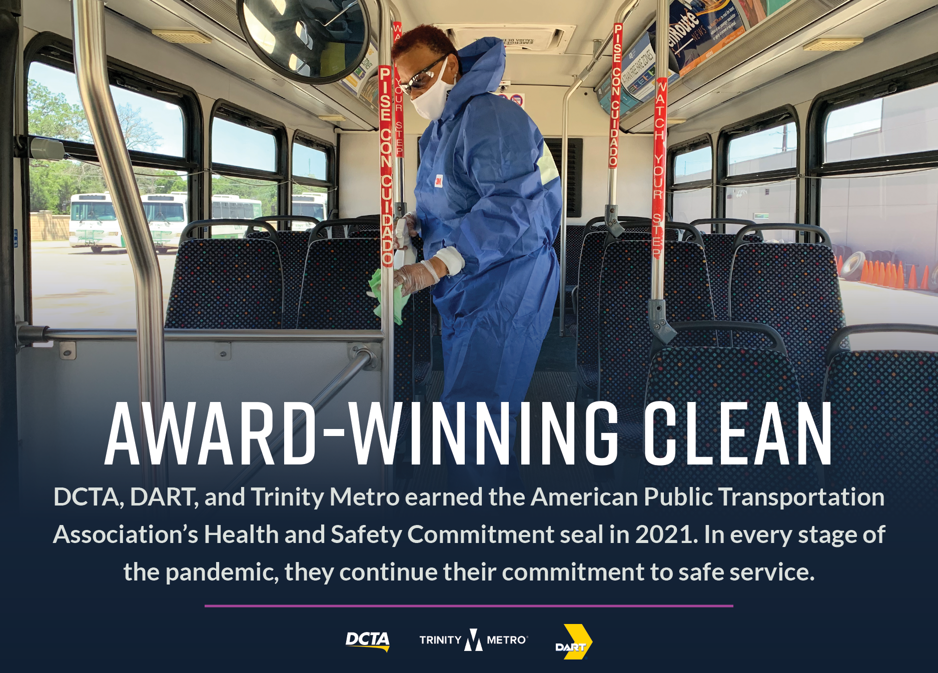 Man cleaning bus in safety suit "Award-Winning Clean"