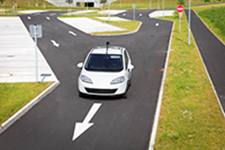 Car following the road signs