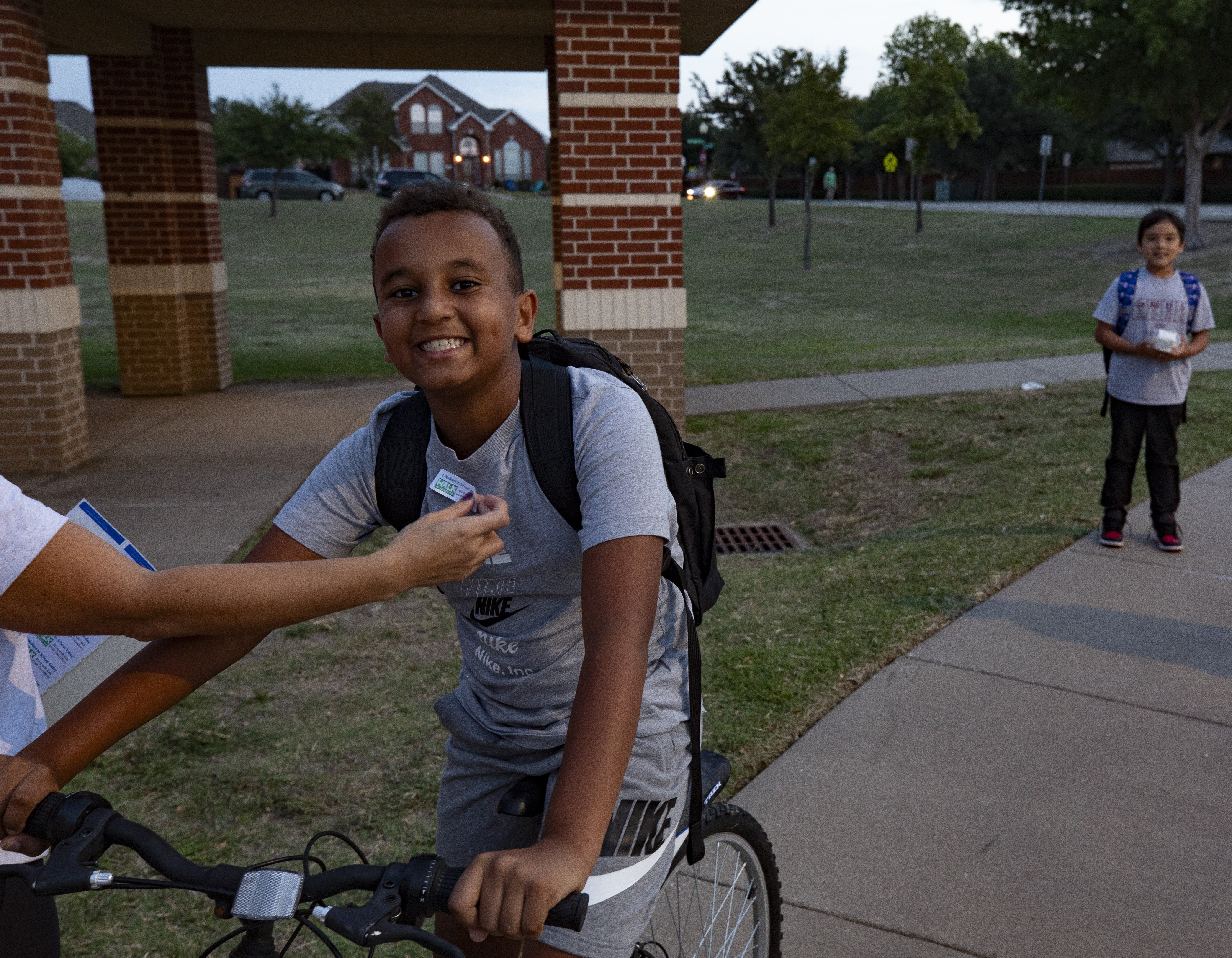 Student riding bike to school
