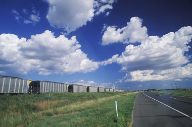 A picture of a train on a railroad
