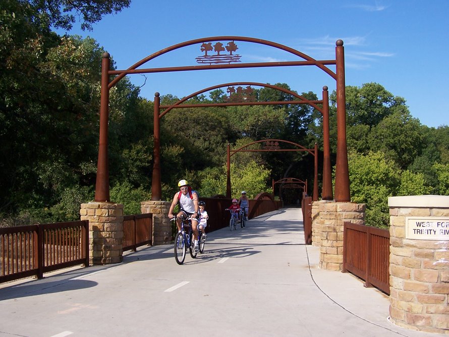 Cyclist riding near River Legacy Park