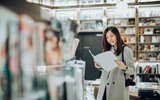 Woman reading generic magazine