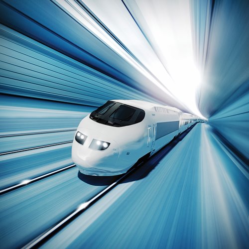 Futuristic bullet train traveling in time elapsed tunnel