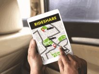 This is an image of someone holding a brochure for Rideshare
