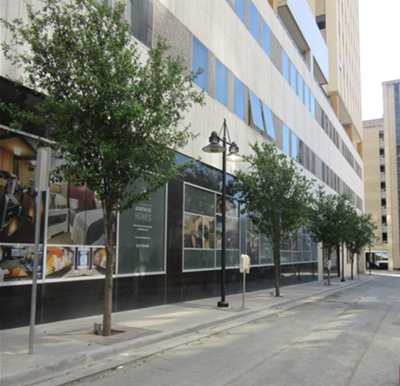 This is an image of a sidewalk near the 11-story formerly vacant office in downtown Dallas that is a part of The Continental Mixed-Use project.