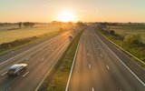 Sunrise above a divided highway