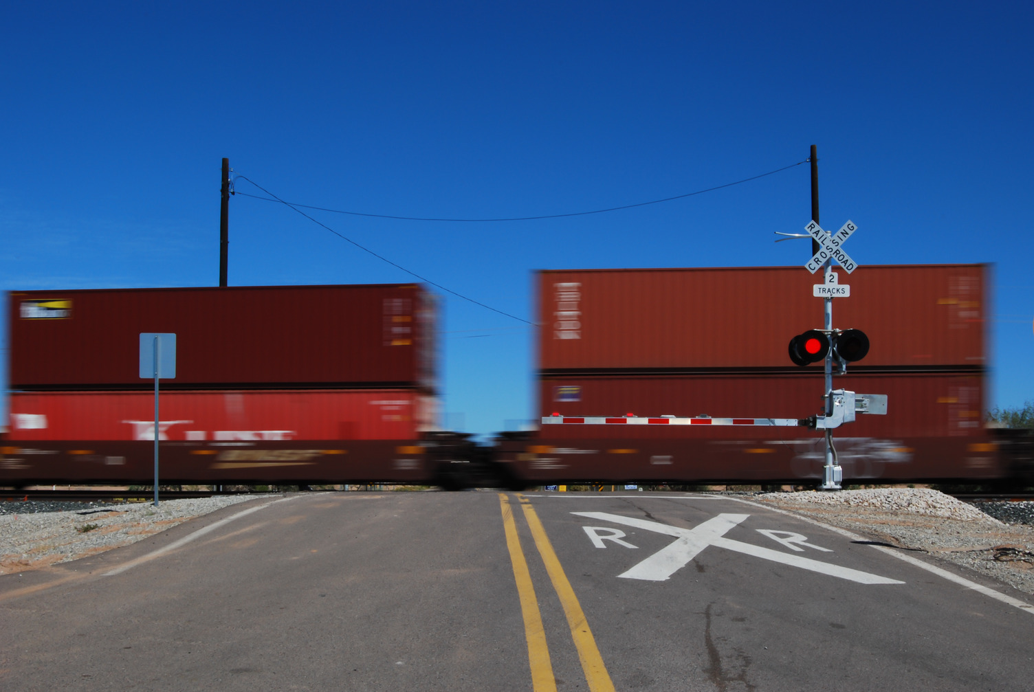 A train traveling through a crossing